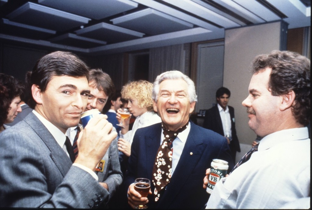 MP John Brumby (left) and Prime Minister Bob Hawke (centre) join colleagues in the Senate Committee Room for a beer and a laugh. MP John Brumby (left) and Prime Minister Bob Hawke (centre) join colleagues in the Senate Committee Room for a beer and a laugh.